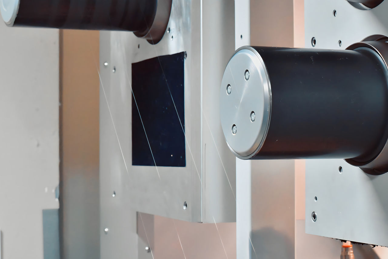 Filament passing over a godet roll 