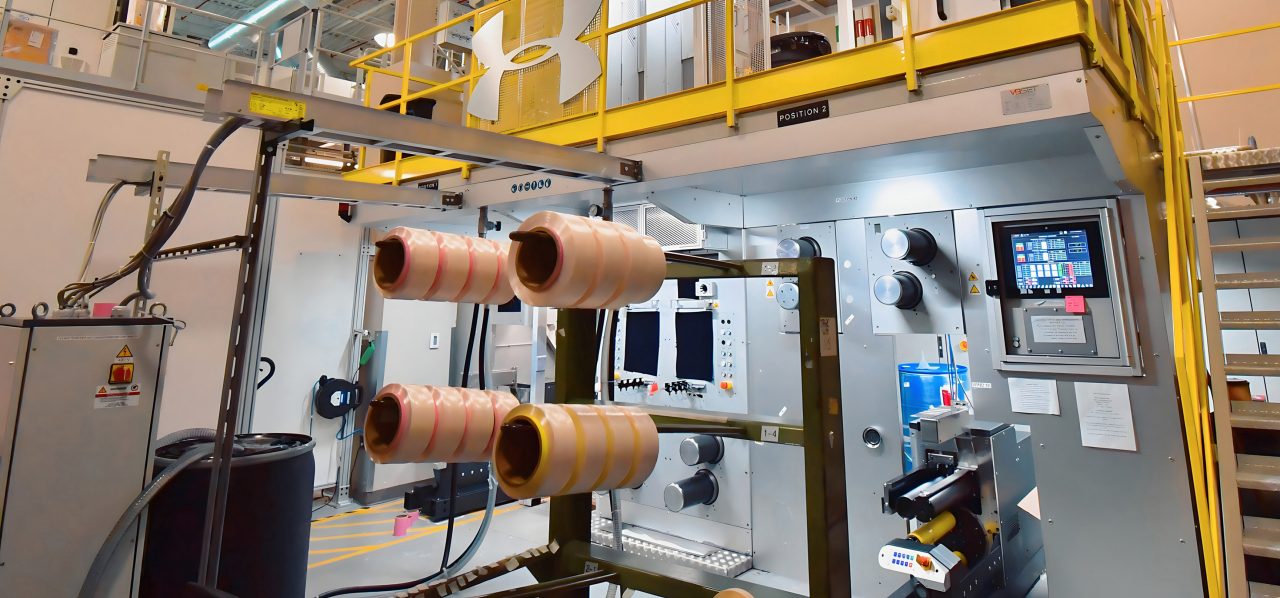 Rolls of finished filament yarn in the Fiber Spinning Lab at The Nonwovens Institute, NC State University.