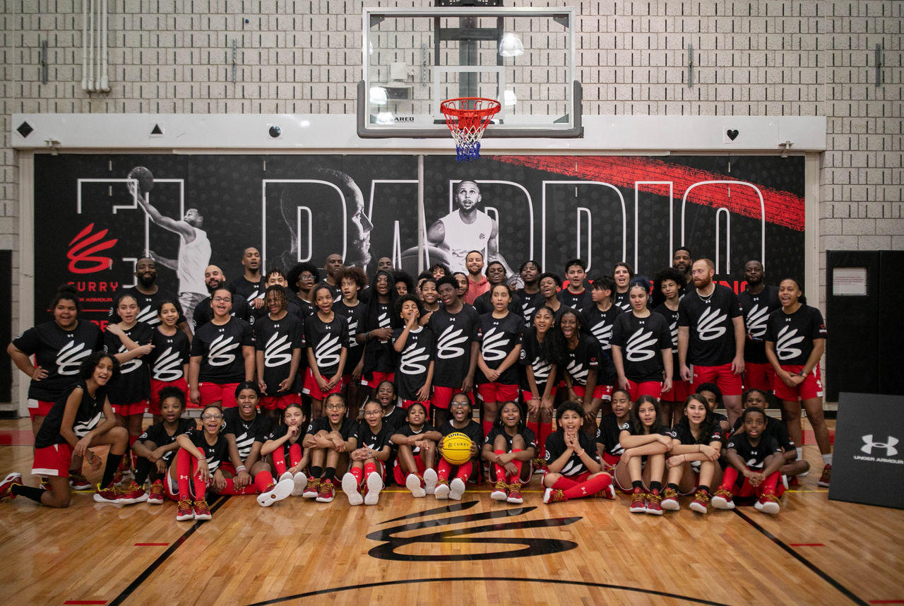 Group photo on basketball court 