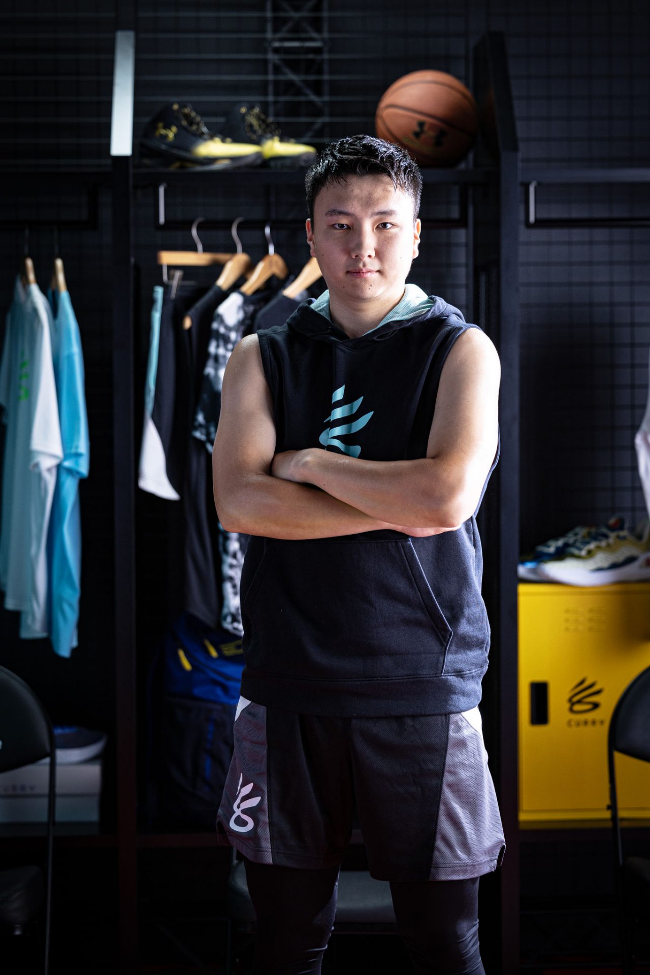Basketball player standing in a locker room