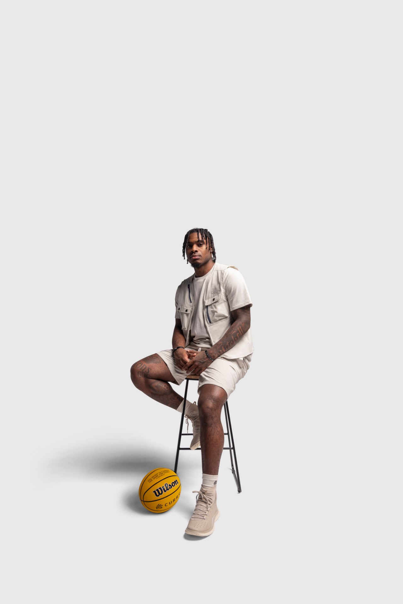 Davion Mitchell on stool